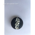 Eco-friendly clothing buttons made from shell fragments